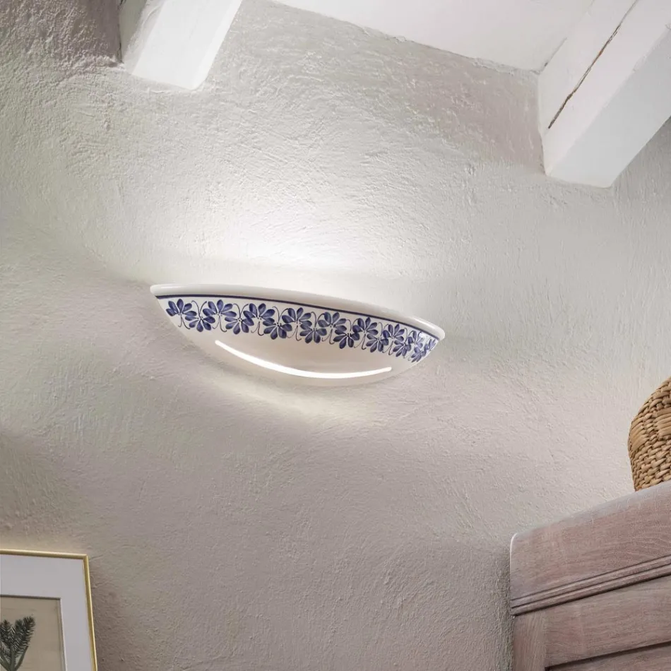 Llamba muri prej qeramike artizanale dhe dekorime blu te lyera me dore - Trieste Viadurini