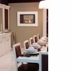 Zjarri me mur të bardhë Bio me dizajn modern me futje qelqi Erica Viadurini