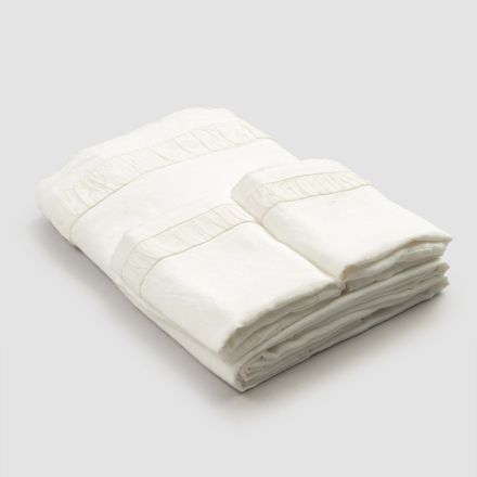 Komplet çarçafësh dopio prej liri të lehtë me reliev - Goffro Viadurini