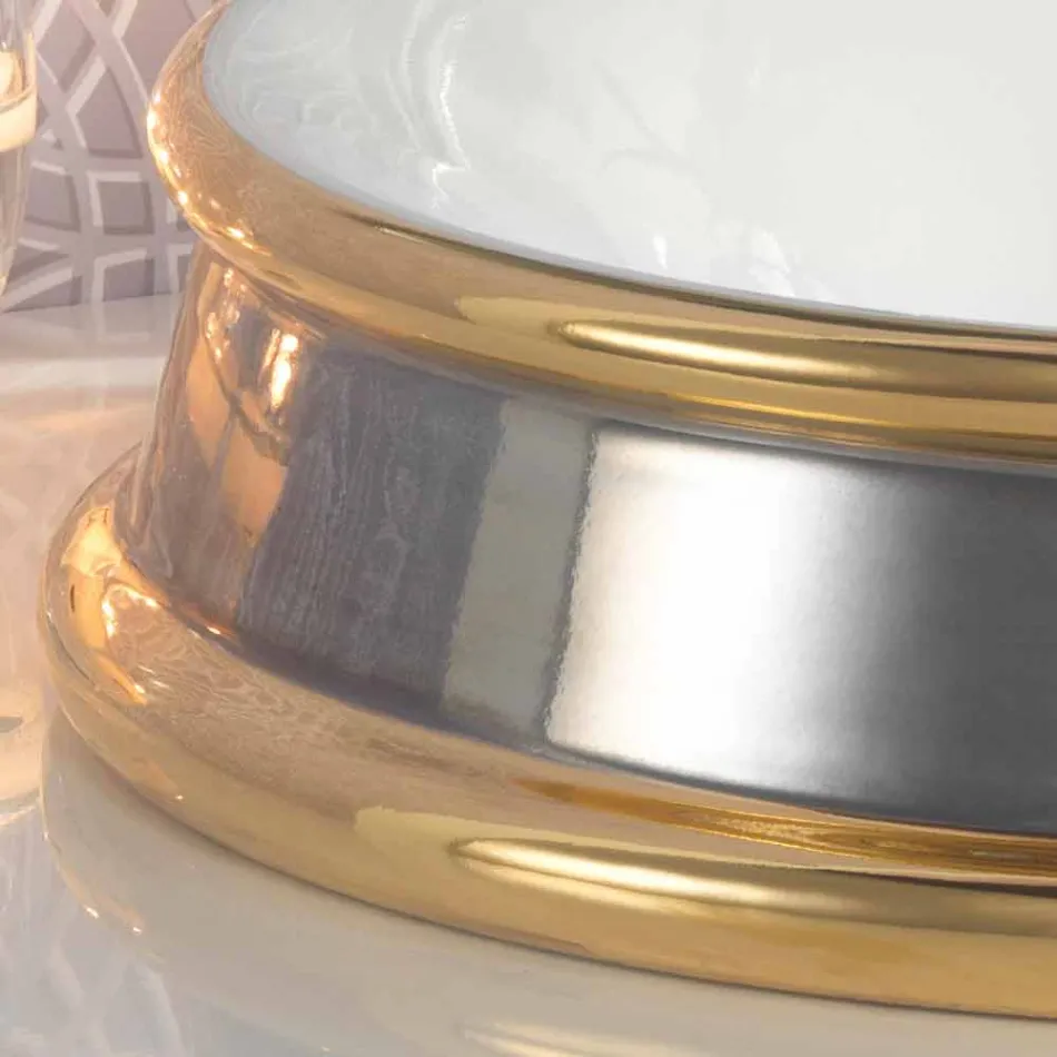 Dizenjoni lavamanin e banjës gjysmë të prerë në argjilën e zjarrit të bërë në Itali, Manilo Viadurini