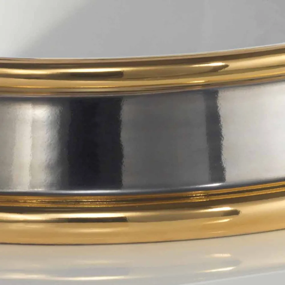 Dizenjoni lavamanin e banjës gjysmë të prerë në argjilën e zjarrit të bërë në Itali, Manilo Viadurini