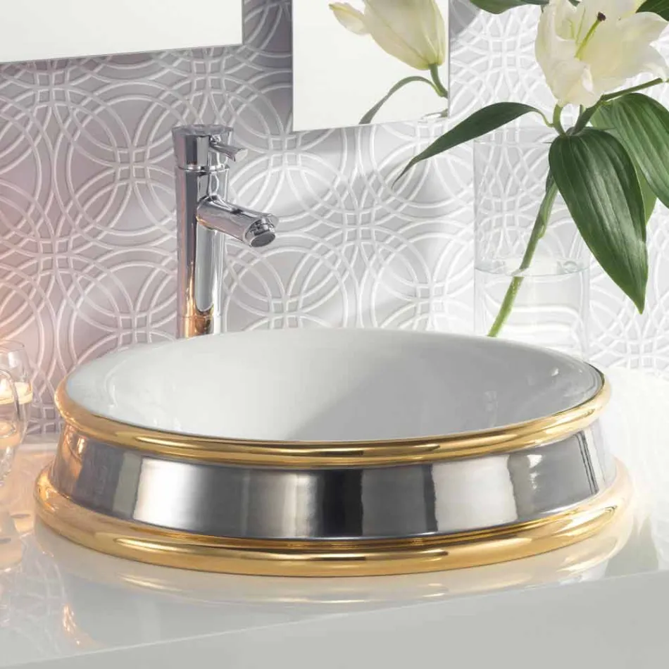 Dizenjoni lavamanin e banjës gjysmë të prerë në argjilën e zjarrit të bërë në Itali, Manilo Viadurini