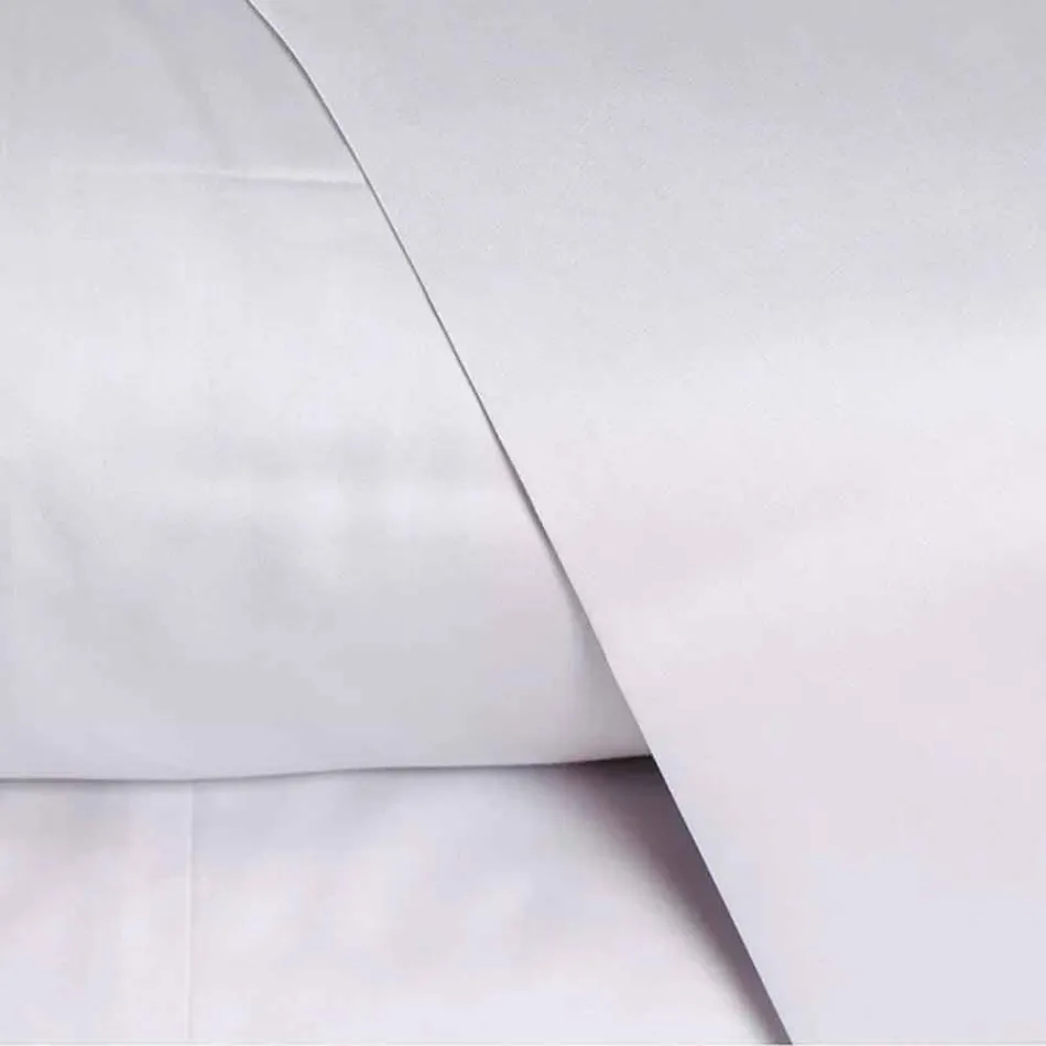 Fletët prej pambuku prej pambuku të vendosura për ngjyrën e ngurtë të krevateve dyshe - Freesia Viadurini