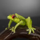 Figurinë në formën e një bretkosë në një degë në qelq me ngjyrë prodhuar në Itali - Froggy Viadurini