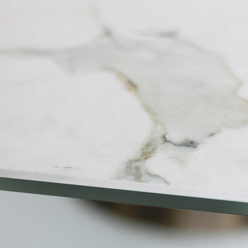 Tavolinë fikse me bazë çeliku dhe majë qeramike Made in Italy - Pantallona Viadurini